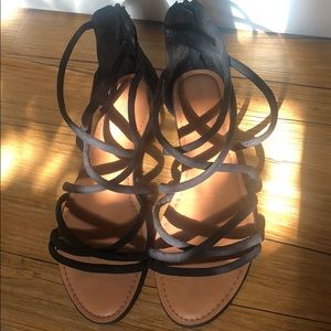 Cute strappy black sandals.